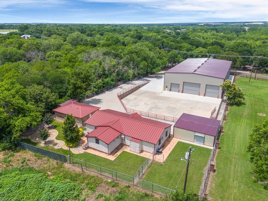 Prime property can be residential or commercially zoned. 1.2 miles from the Mckinney Airport, providing exceptional accessibility for logistics and travel needs.  Situated within the Extraterritorial Jurisdiction (ETJ), this property benefits from favorable zoning regulations and potential development options.  Whether you're looking for a home, a business with a home, a rental property or a combination of all, this property offers endless possibilities.  The property presents a unique opportunity for those seeking space, convenience, and flexibility in a beautiful setting.  No HOA.  Rare and unique property available on 1.25 acres in Mckinney outside of city limits.  The 3-bedroom, 2-bathroom home is spacious and designed with flexibility in mind.  The open layout offers plenty of room for customization-whether you want to create the perfect home or a fully functional office space.  The home comes complete with stainless steel appliances, washer, dryer and large picture window that provides expansive views of the industrial warehouse.  The owner thoughtfully added custom stonework to the exterior, enhancing both the aesthetic and the durability.  Built in 2024, the 9,880 sq ft warehouse brings high-quality space constructed with red oxide steel designed to maximum functionality.  A large industrial facility ideal for manufacturing, warehousing, or commercial use, featuring high ceilings 32' peak and 26' sides, ground level loading docks, office space, bathroom and more.  Specifications and more are loaded into the transaction desk in documents in ntreis.   Pricing includes commercial mls 20830199