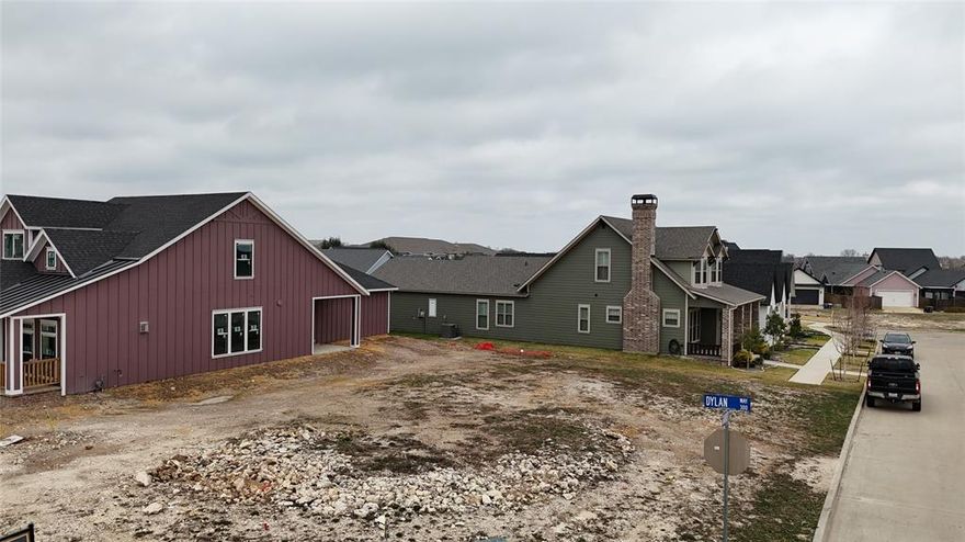 Build your custom dream home in the highly sought-after MidTowne subdivision with Corp Custom Homes, a respected local builder known for quality craftsmanship and thoughtful design. This prime homesite offers the perfect blend of location, community, and lifestyle in one of Midlothian’s most desirable neighborhoods. MidTowne is loved for its established feel, beautiful surroundings, and convenient access to shopping, dining, parks, and major highways, while still maintaining a quiet residential atmosphere. The lot is buildable and ready for your vision, allowing flexibility in floor plan and elevation to create a home that truly fits your lifestyle. Utilities are available, and the PID rate is .12. This is a rare opportunity to build new in a community that continues to hold strong value and appeal, don’t miss your chance to call MidTowne home.