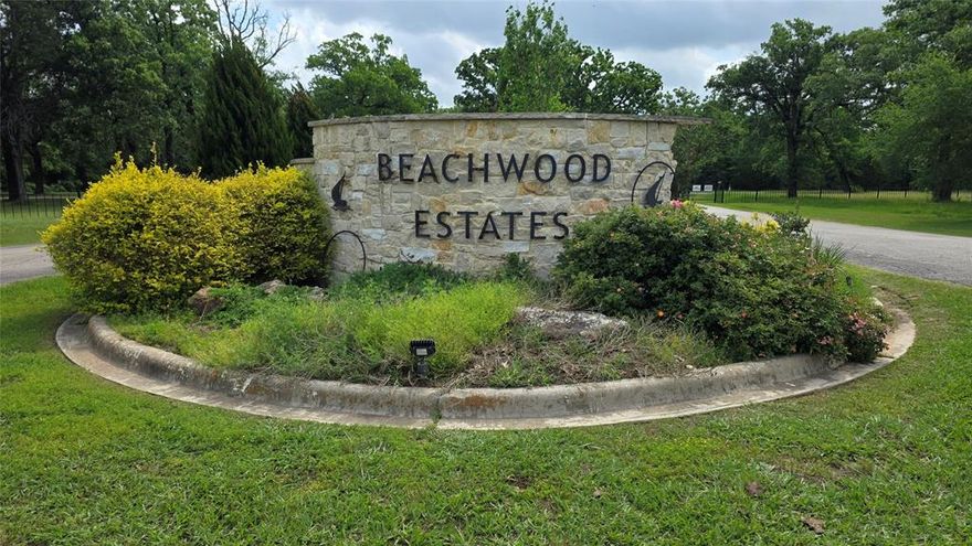 Tucked inside a desirable gated community, this beautifully wooded lot offers the perfect blend of privacy and lifestyle. Towering trees create a peaceful setting ideal for your future lake retreat or full-time home. Enjoy exclusive access to community amenities including a private boat ramp, boathouse, and refreshing pool, making lake days effortless and fun. Whether you're envisioning weekend getaways or building your dream home, this property delivers both tranquility and convenience. Secure, scenic, and ready for your vision—this is your opportunity to own a slice of lake living at its best.