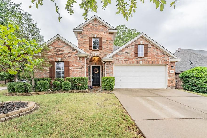 Beautiful one story brick home nestled on a corner lot in the highly sought after Keller ISD! Bright & open floor plan filled with natural light boasting tall ceilings & crown molding. You will love the 6 inch Acacia hardwoods in the dining room, 2nd living & hallway. Kitchen is great size featuring butler's pantry with wine fridge, granite countertops, gas range, Bosch 800 series dishwasher, breakfast nook, window bench, & walk in pantry. Spacious family room boasts gas fireplace with ceramic logs, cast stone & tile surrounding. Primary bedroom equipped with crown molding, Elfa organizing system in walk in closet with LED track lighting, double sinks, garden tub & separate tile shower. Enjoy entertaining on screened in patio with tile flooring, or on oversized patio area in your private backyard with mature trees. Short walk to the park with a playground & splash pad & the award winning elementary school. Great location close to shopping including the new HEB, restaurants & more!