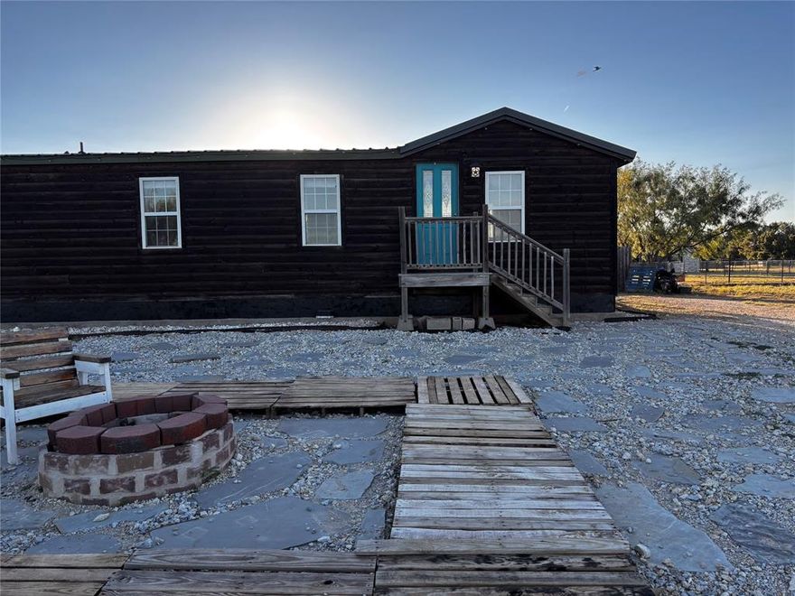 Welcome to this charming 3-bedroom, 2-bath home nestled on 5 acres in Tuscola, offering the perfect blend of rustic charm and wide-open country living! This log-cabin-style residence provides warmth, character, and plenty of room to spread out and enjoy peaceful surroundings.
Inside, you’ll find a large living area with plenty of space for gathering and relaxing, along with a designated dining area ideal for family meals or hosting guests. The good-sized kitchen features abundant countertop and cabinet space, creating both convenience and functionality for everyday cooking—and the white refrigerator conveys with the home, adding even more value.
All three bedrooms are generously sized, providing comfort and versatility. The primary suite includes its own private ensuite, offering a quiet retreat at the end of the day.
Step outside to endless possibilities—wide-open acreage gives you room to create your dream country lifestyle. Whether you envision adding a shop, barn, animals, a garden, or outdoor entertainment spaces, this property can accommodate it all.
If you’re seeking tranquility, space, and authentic Texas charm, this home delivers it beautifully. Come make this slice of country living your very own!