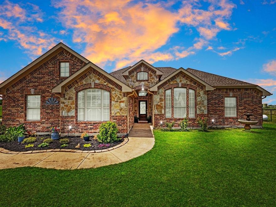 Welcome to your slice of Texas country living on 1.72 acres in Ponder! Tucked away and set back from the road, this beautifully maintained 4 bedroom, 2 bath home offers the perfect blend of privacy, space, and functionality. With open land behind you and wide Texas skies all around, this property delivers the peaceful lifestyle buyers are searching for without sacrificing comfort. Step inside to a spacious, open-concept layout featuring a large kitchen and living area designed for gathering and entertaining. The kitchen offers ample counter space, modern finishes, and a large island with seating that flows seamlessly into the main living room. The home features two living areas, giving you flexibility for a game room, media space, or second lounge. The oversized primary suite is a true retreat, offering plenty of room to unwind with a layout that feels both private and spacious. Stepping out back to your spacious covered patio with exposed wood beam accents, perfect for entertaining, grilling, or soaking in those Texas sunsets. With 1.72 acres, there’s plenty of room to add a shop, pool, or simply enjoy wide open spaces. The layout is thoughtfully set up for both relaxation and functionality, create your own private backyard retreat with a future pool while keeping a separate fenced area ideal for pets. Beyond that, the additional fenced sections offer endless possibilities, whether you need space for horses, an RV, or simply room to spread out and enjoy true country living.
If you’ve been looking for quiet country living with modern comfort and room to grow, this property checks all the boxes.