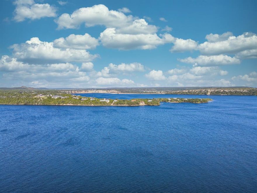WOW! Majestic 2nd story lake views of Possum Kingdom Lake! Build your dream home with gorgeous sunrises & sunsets! This property also includes complimentary 36 rounds of golf annually included with your hoa on their 18 hole championship course! Enjoy all that the Cliffs Resort has to offer: gated community, full service marina, restaurant, fitness center, spa, tennis courts, hotel, two swimming pools, dry boat storage facility, conference center and beach! Relax at the Cliffs & build your dream home! Several building options. Bring your own builder. Live, Love, Life at the Lake! (This is lot 41.)