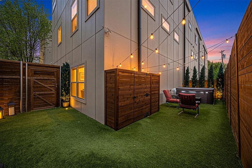 Welcome home to this stunning 3-story corner-unit condo at 5615 Bryan Parkway #D — where thoughtful updates, flexible outdoor living, and an unbeatable location come together in one exceptional package.

This spacious 2-bedroom, 2.5-bath residence offers the feel of a home, with the convenience of condo living. Tucked away at the rear of the property but within easy walking distance to the vibrant Lower Greenville area, this home offers the best of both worlds. Bathed in natural light as a coveted corner unit, you'll enjoy an extra full side of windows, a flexible layout, and quiet privacy that truly sets it apart.

Step inside and notice the beautifully maintained condo with thoughtful updates over the years of ownership. Some of these include, re-sanded and stained hardwood floors, paint with accent walls throughout, remote controlled blinds on high windows, a new dishwasher, and elegant dimmer switches added by a licensed electrician — the kind of details that make a home feel truly curated. The list of updates goes on, reflecting years of pride in ownership.

Outside, enjoy your oversized, L-shaped, private turfed yard — a rare find — complete with electrical already in place for a hot tub and an incredible rooftop with unbeatable downtown views. A balcony off the main level adds a third outdoor space to enjoy, along with an additional private parking space unique to this unit. Whether you're entertaining or unwinding after a long day, this outdoor space delivers. The oversized garage provides exceptional storage and the convenience of a workspace seldom found.

This unbeatable location is in close proximity to Lakewood, Lower Greenville, downtown and is a quick jaunt over to 75, with easy access to many of Dallas's most beloved restaurants, coffee shops, boutiques, and grocery stores.

This one truly checks every box. Don't miss your chance to call it home!