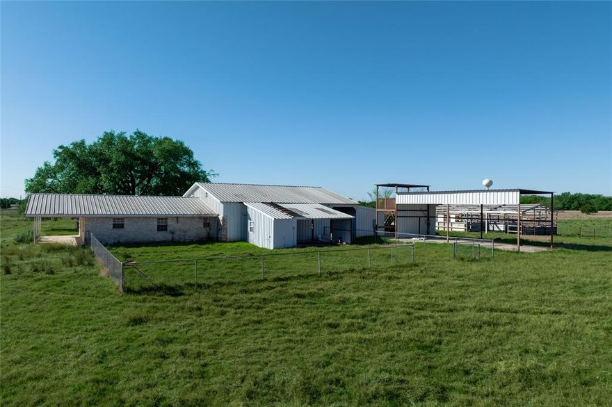 NO ZONING RESTRICTIONS! PERFECT INVESTMENT OPPORTUNITY! Experience unparalleled Texas country living on 40.46± acres of unrestricted, manicured pastures peppered with majestic oak trees and native woodlands. This picturesque estate boasts a charming 2-bed, 1-bath ranch home with an open floor plan offering timeless appeal and direct access to equestrian facilities. Mature shade trees and expansive views set the stage for idyllic rural lifestyle pursuits — from horses and livestock to hobby farming or simply enjoying serene privacy. The property delivers exceptional improvements including multiple barns and arenas designed for horse enthusiasts or agricultural use: a main barn with five 12’x12’ custom Priefert stalls, tack and feed rooms, indoor wash rack with hot and cold water, 12’ concrete alley, pull-through trailer storage and implement buildings, plus a secondary barn with additional stalls and hay storage. Outdoor features include a 75’x150’ sand arena, round pen, cross fencing, RV barn with concrete floor, carport, fenced front and back lawns, and above-ground pool with deck — all nestled just minutes from Salado schools and shopping. Unrestricted land, extensive horse facilities, and exceptional location on FM-2484 make this a rare Texas ranch property with endless possibilities for equestrian pursuits, development, recreation, and country living.