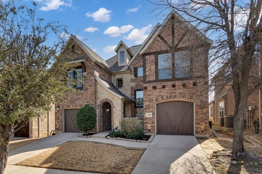 Welcome to refined living in the Isabel Addition of Lantana, where upscale design meets an active, amenity rich lifestyle. This impressive two level home blends modern luxury with functionality, offering a spacious and beautifully curated interior. The kitchen makes a bold statement with top-of-the-line appliances, center island, granite countertops, breakfast bar. Custom built-in dog water and feeding station seamlessly integrated into the cabinetry, featuring a dedicated alcove with designer tile backsplash, wall-mounted pot filler for easy water access, and dual stainless-steel bowls set into a stone base. Thoughtfully designed to keep pet essentials organized and contained while elevating everyday functionality with a clean, high-end finish that complements the kitchen aesthetics. 

The living room features soaring ceilings and a striking granite fireplace that anchors the space with warmth and style. Plantation shutters throughout the main level, while the dedicated office with glass door entry and moody designer paint creates a sophisticated work-from-home retreat. The primary suite is privately situated on the main level and delivers a true spa inspired experience with dual separate sinks, a garden tub, and a separate shower. Upstairs, you’ll find plush carpeted bedrooms, a spacious loft with custom built-ins, and media room perfect for movie nights or game days. The expansive laundry room includes built-in cabinetry and even a pet wash station for added convenience.

With three distinct living spaces, high ceilings, and upscale finishes throughout, this home offers both comfort and elevated design. Residents of Isabel enjoy access to five sparkling community pools, miles of scenic trails, two-mile walking path, parks, playgrounds, fitness facilities all creating a neighborhood atmosphere designed for an active lifestyle. 

Discounted rate options and no lender fee future refinancing may be available for qualified buyers of this home.