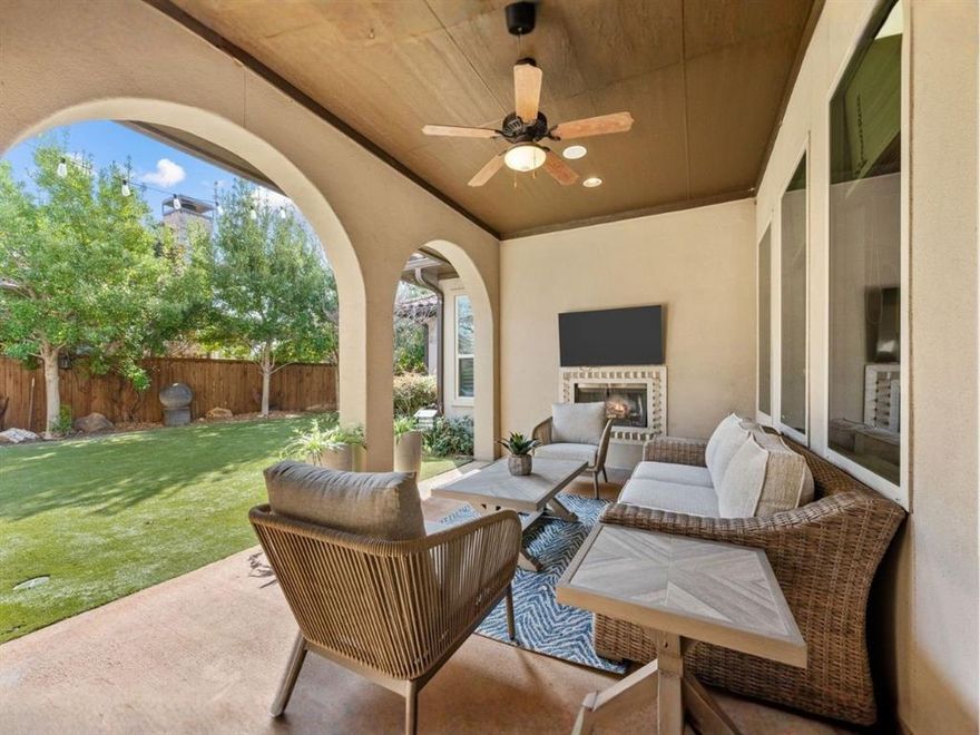 Experience refined Mediterranean elegance in coveted Austin Waters. This custom-built Darling Home is a true statement of timeless luxury, showcasing a striking stucco facade, classic tile roof, and impeccable architectural detail throughout. From the moment you enter, rich hardwood floors, 5-inch baseboards, soaring 8-foot doors, and stunning wood beams create a warm yet sophisticated ambiance filled with natural light. Designed for both elevated entertaining and effortless daily living, the thoughtfully curated floorplan offers spacious living areas, plantation shutters, and walk-in closets in every bedroom. Every finish was intentionally selected and expertly crafted, delivering a level of quality that discerning buyers will immediately appreciate. Step outside to enjoy three distinct patio spaces overlooking an oversized lot with custom landscaping, perfect for hosting gatherings or enjoying quiet evenings under the Texas sky. A rare 3-car garage completes the home’s impressive functionality. Positioned just minutes from the Dallas North Tollway and Highway 121, with premier destinations including The Star, Legacy West, and Grandscape at your doorstep and only 20 minutes to both Love Field and DFW Airport. This location offers unparalleled convenience for those who value both luxury and accessibility! Homes of this caliber in Austin Waters rarely become available. Schedule your private tour today and secure the lifestyle you deserve before this exceptional opportunity is gone.