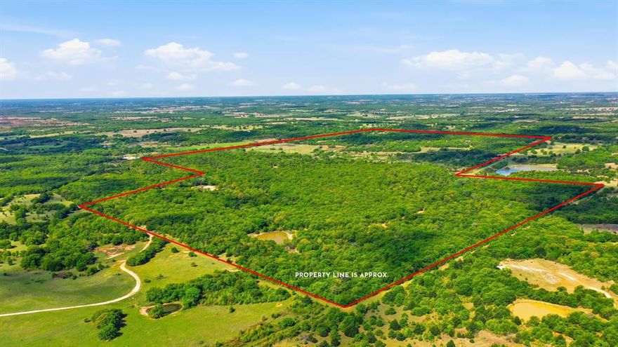 377+ Acre Premier North Texas Recreational & Hunting Retreat Welcome to an exceptional 377+ acre legacy property in the rolling hills of Montague County where rugged natural beauty meets thoughtful, turnkey improvements. With over 200 feet of elevation change, this ranch offers a rare combination of panoramic views, dense hardwood cover, and open pastureland ideal for both recreation and wildlife management. Designed with the avid outdoorsman in mind, the property is a fully equipped hunting and shooting retreat featuring an established skeet shooting range and a dedicated rifle range. The land supports abundant native wildlife, creating an outstanding environment for year-round recreation. The ranch is equally impressive in its improvements, offering four residences totaling over 7,000 square feet of living space. The main home is well appointed for comfort and entertaining, featuring a 6 burner gas range, dual dishwashers, tankless water heaters, wireless televisions, and expansive covered front and back porches that capture the surrounding views. A wood-burning stove and Cowboy Cauldron firepit create inviting gathering spaces for cool Texas evenings. Additional accommodations include a recently renovated casita and a log cabin with a new roof perfect for guests, family, or ranch staff. A 3,600 square foot metal barn provides ample storage for equipment, ATVs, and ranch operations. Water is abundant with two wells and five large ponds, supporting both livestock and wildlife. Infrastructure has been carefully considered with a 20KW Generac backup generator, whole-house reverse osmosis water filtration system, and reliable connectivity via Nextlink internet with Starlink backup. Safety and security features include a Class 5 above-ground tornado shelter, a dedicated gun room, and a secure safe. Rare opportunity to own a fully improved recreational ranch that seamlessly blends comfort, functionality, and natural beauty just a short drive from the DFW Metroplex.