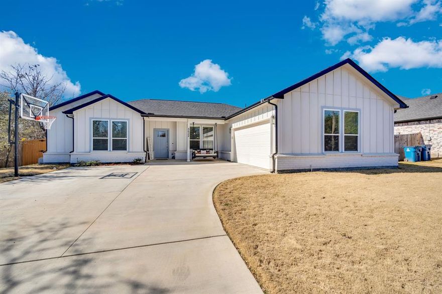 Welcome to 5622 Mesa Loop in the gated community of Canyon Creek—a well-designed single-story home just minutes from Lake Granbury, offering comfort, functionality, and access to incredible neighborhood amenities.

Built in 2021, this 3-bedroom, 2-bath home features an open and inviting layout with 1,795 sq ft of living space. The heart of the home is the spacious living area that flows seamlessly into the kitchen and dining area—ideal for everyday living and entertaining. The kitchen is equipped with granite countertops, a large island, electric cooktop and oven, pantry, and ample cabinet space, all accented by decorative lighting and modern finishes.

The primary suite is thoughtfully separated from the secondary bedrooms, offering privacy and retreat. It features a generous bedroom, spa-like ensuite bath, and a large walk-in closet. Two additional bedrooms share a full bath, perfect for guests, family, or a home office. A dedicated laundry room adds convenience, while the side-facing 2-car garage enhances curb appeal.

Enjoy outdoor living with a covered patio and fenced backyard, ready for relaxing evenings or weekend gatherings. The home sits on a low-maintenance lot, making it ideal for full-time living or a lock-and-leave lifestyle.

Canyon Creek POA provides 24-7 gated security and access to community amenities, with Lake Granbury just moments away for boating, fishing, and recreation. Located within Granbury ISD and offering easy access to town, dining, and shopping, this home blends modern comfort with lake-area living.