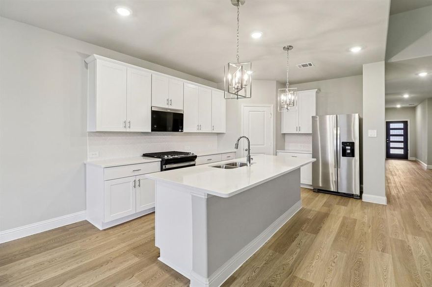 BRAND NEW energy - efficient home May 2026! Sip your coffee in the Providence's covered outdoor living space. Inside, enjoy sizeable bedrooms for the whole family. White cabinets with veined white quartz countertops, tan tone EVP flooring with dark beige tweed carpet. Spend the weekends debating what activity to do in this amenity-filled community, make a splash in the resort-style pool, pick up a game of basketball, or let the kids loose on the playground. With quick access to US 380, residents will enjoy the benefits of a short commute to downtown McKinney, Frisco, or Richardson to enjoy nearby shopping and entertainment. Each of our homes is built with innovative, energy-efficient features designed to help you enjoy more savings, better health, real comfort and peace of mind.