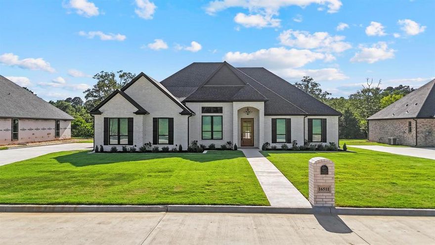 ***2025 PARADE HOME***
This new construction home is located in a gated subdivision in a serene country setting minutes from everything that S. Tyler has to offer! Live like royalty in prestigious Crown Point Estates II as this planned development consists of only 21 lots total with HALF ACRE LOTS. The exterior of the home is brick with a 10' and 12' pitch roof and grand entrance. This home has 4 bedrooms PLUS a formal dining, HUGE gourmet kitchen, 3 full bathrooms, and 2 car side-entry garage.THERE ARE SO MANY UPGRADES IN THIS HOME!! Featuring many high-end features including wood floors, solid countertops, custom cabinets, designer lighting, gas cooktop, refrigerator, foam insulation, lots of moldings and trim work, fireplace, shower and separate garden tub in master bath, 13' ceilings and more! There is an amazing oversized covered patio to enjoy the large backyard with privacy fence! High-speed internet and cable is available through Optimum! Welcome to YOUR new Home!!