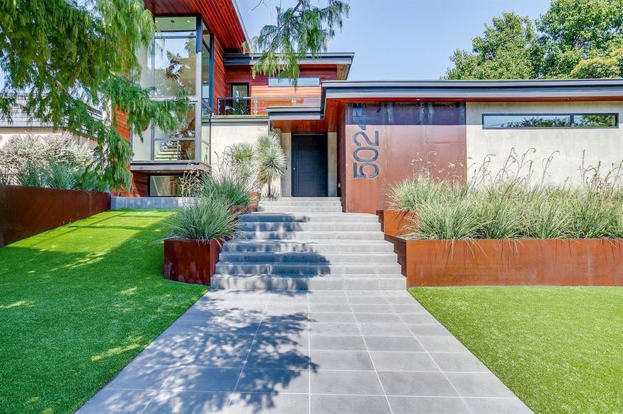 A high-design, modern masterpiece designed by RGD+B, reimagined from a 1972 home, blending original structures with all new systems, steel framing, modern finishes, and contemporary architecture. This home boasts spacious open living areas with large frame-windows and sliding glass doors that merge indoor and outdoor living. The courtyard and pool are complimented with rooftop gardens, synthetic turf grass and water features. The use of rich natural materials throughout, leathered marble, white oak flooring, black walnut cabinetry, smoked glass, custom cast concrete and steel provide warmth, texture and sophistication. The luxurious primary suite is located on the main floor with views of the pool and a fireplace. There are custom closets and a spa-like ensuite bath. The second level includes two generously sized ensuite bedrooms, a game room that can be used as a fourth bedroom, also with ensuite bath, an office and a rooftop patio. There is also a separate air conditioned space that would serve as a wonderful workout room or home office, very private with a large walk in safe. The kitchen is equipped with professional grade appliances, a custom steel vent hood, large island and abundant storage. The waterfall island is equipped with additional storage and has plenty of space for bar stools that make for the perfect eat in kitchen. The utility room is attached to the garage and even has a dog wash station and abundant storage with a custom pantry. You will not want to miss the glass wine room or the wet bar that is conveniently located for entertaining and serving.  The courtyard hosts an in ground gunite pool, which can be seen from nearly every room on the primary level. Complete with water features and a gas outdoor fireplace, the exterior space is truly an ideal spot. The living room, kitchen and primary suite all open to the courtyard and have beautiful views of the pool. The perfect location, just a golf cart ride to River Crest Country Club and Camp Bowie!