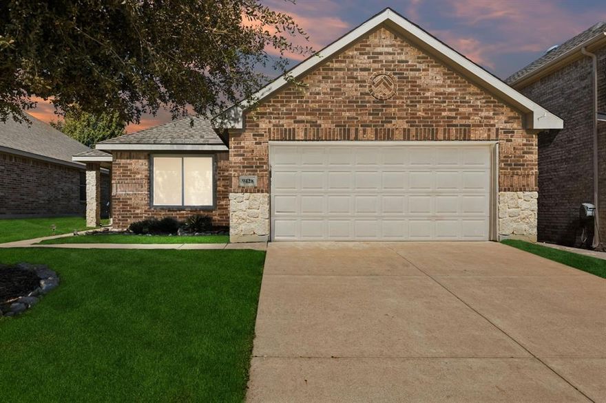 Welcome to 9428 Tierra Verde Drive! Built in 2011 and beautifully updated, this 3-bed, 2-bath Fort Worth home offers 1,556 sqft of open-concept living with gorgeous wood-look tile floors and a stunning brick-and-stone fireplace. Enjoy peace of mind with major upgrades including a brand-new roof (2023), all-new Pella windows and sliding back door (2025), new AC components, fresh paint, epoxy garage floor, and newly sodded front yard. The kitchen features a large island and dining area overlooking the backyard, while the primary suite boasts a remodeled shower (2024). Fantastic location—just 10 minutes to Alliance Airport and close to Presidio, Alliance Town Center, and the exciting new North City Shopping Center! Move-in ready with style, comfort, and upgrades that matter!
