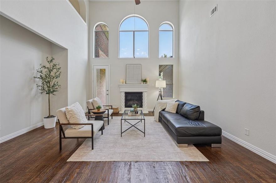 Elegant Retreat in Deerfield North – walking distance to Basis Charter School of Plano and South-facing house. Surrounded by Nature, Designed for Comfort. Nestled among mature trees and lush landscaping, this two-story brick and stone beauty offer 4,523 square feet of luxurious living in one of Plano’s most desirable neighborhoods. Thoughtfully designed, the home features 5 spacious bedrooms and 3.5 bathrooms, blending elegance and functionality throughout. The main floor features formal living and dining spaces accented by plantation shutters and hand-scraped hardwood floors. A private study near the entry provides a peaceful space for work or study. The gourmet kitchen is equipped with stainless steel appliances, a gas cooktop, granite countertops, stylish cabinetry, and designer lighting—flowing into a bright dining area and a grand family room with soaring ceilings. The bay-windowed primary suite is a serene haven, adorned with modern furnishings and cozy finishes. Upstairs, enjoy a media room, game room, and four additional bedrooms thoughtfully arranged into three separate wings—perfect for family living and guest privacy. Large windows with plantation shutters frame tranquil treetop views, inviting natural light and a calming ambiance. Located within top-rated Frisco ISD, Basis Charter School, and minutes from Heritage Yards, Lt. Russell Steindam Park, and White Rock Creek trails. Just a short drive to The Shops at Legacy, Legacy West, Stonebriar Mall, The Star, and Hall Office Park—this home offers the ideal balance of work and leisure. Luxury, lifestyle, and location—this home has it all.