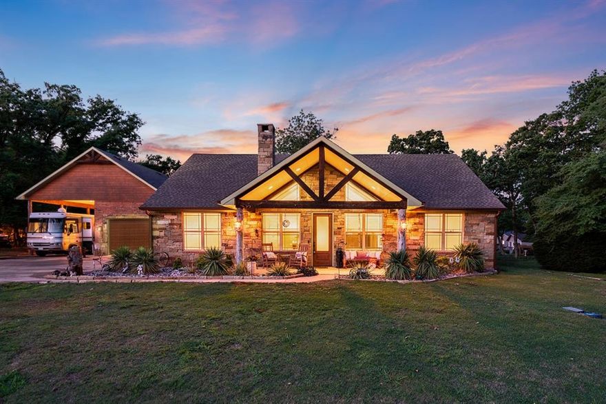 Beautiful custom built home with stunning water views, featuring 4 bedrooms and 3 baths on two quiet lots in a desirable gated community. This spacious home showcases Oklahoma stack stone, tile floors, a vaulted ceiling, cozy fireplace, and rich woodwork throughout. The kitchen includes an island ideal for gathering, while sliding barn doors add character and charm.

A large two-car garage and covered motorhome parking with utility hookups provide plenty of space for vehicles, hobbies, and storage. The fenced backyard is perfect for relaxing or entertaining, complete with a covered porch and a gorgeous gazebo. Strong curb appeal shines with a covered front porch and tasteful landscaping. 

Seller offering $10,000 in concessions toward buyer’s closing costs, adding exceptional value to this remarkable property that blends privacy, elegance, and scenic water views.