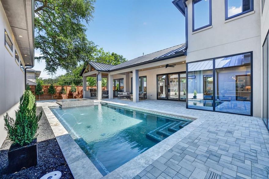 Designed by Dallas luxury experts Park Avenue Custom Homes, this 6,882-square-foot architectural masterpiece at 11028 Edgemere Drive delivers refined living in the quiet enclave of Preston Brook Estates, nestled within prestigious Preston Hollow.

Every detail reflects exceptional craftsmanship, thoughtful design, and uncompromising quality. The home offers six bedrooms, six full and three half baths, including a rare outdoor shower, along with a dedicated study, dual game rooms, and a media room—providing space for both everyday living and elevated entertaining.

At the heart of the home is a beautifully appointed chef’s kitchen featuring top-tier appliances, a statement island, and custom cabinetry. Expansive living areas are flooded with natural light, showcasing soaring ceilings, warm wood tones, and refined textures throughout.

The main family room opens seamlessly to a resort-style pool, covered patio, and professionally landscaped yard—creating an ideal indoor-outdoor flow for entertaining or private relaxation. A four-car garage, sophisticated lighting, and bespoke architectural details complete this exceptional offering in one of Dallas’ most sought-after neighborhoods.
