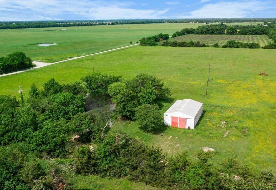 If wide open spaces are what you’re looking for, this beautiful slice of Texas countryside is ready to welcome you home. Nestled on 10.8 unrestricted acres, this property offers endless potential for those ready to bring their vision to life. Whether you're dreaming of building a rustic farmhouse, creating a peaceful weekend getaway, or establishing your full-time country retreat, this land provides the perfect blank canvas.

A massive shop adds incredible value and versatility—ideal for hobbyists, business owners, or anyone needing ample space for equipment, storage, or large projects.

With plenty of room to roam, this property is perfect for embracing the country lifestyle. Bring your horses, livestock, and other animals, and enjoy the freedom that comes with unrestricted acreage.

Experience the peace and privacy of rural living while having the opportunity to make this property truly your own. Schedule your showing today and start envisioning the possibilities.