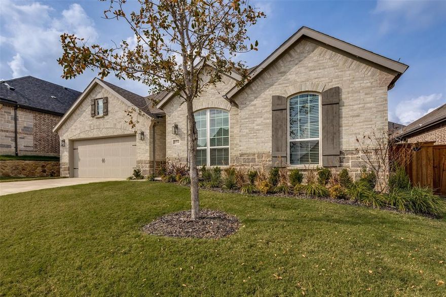 BETTER THAN NEW! BRING US AN OFFER. This beautifully designed one-story home located in the sought-after Reunion Addition. 3 BEDROOM, 2 FAMILY AREAS + PLUS OFFICE can also be used as a fourth bedroom. This attractive and functional floor plan features a lovely FIREPLACE in the family room with HIGH CEILINGS throughout. THREE CAR GARAGE. This 2 YEAR OLD HOME is still under BUILDER WARRANTY and falls within the HIGHLY RATED NWISD. Upgraded finishes, and exceptional functionality throughout. This home provides ample space for both everyday living and entertaining. The covered outdoor living area extends your entertainment space and is perfect for morning coffee or evening relaxation. This inviting open-concept layout is anchored by a stunning kitchen with a large island, upgraded cabinetry, quartz countertops, upgraded appliances, and plenty of counter space. The light-filled breakfast nook is wrapped in windows, allowing natural light to pour in. The living areas feature engineered hardwood floors that add warmth and elegance. You will fall in love with the luxurious main suite, offering a generously sized bedroom and a dream walk-in closet with extensive shelving and storage. The secondary bedrooms also include walk-in closets, providing comfort and convenience for family or guests. The private, easy-to-maintain backyard is perfect for peaceful outdoor enjoyment without the upkeep. Residents of Reunion enjoy desirable amenities including a community pool and cabana, walking trails, and a large scenic pond. This home is ideally located just a short distance from DFW Airport and offers quick access to shopping, dining, and entertainment in the Alliance area. This is an exceptional opportunity to own a beautifully upgraded home in a thriving master-planned community. Don’t miss this unique opportunity. Motivated sellers.