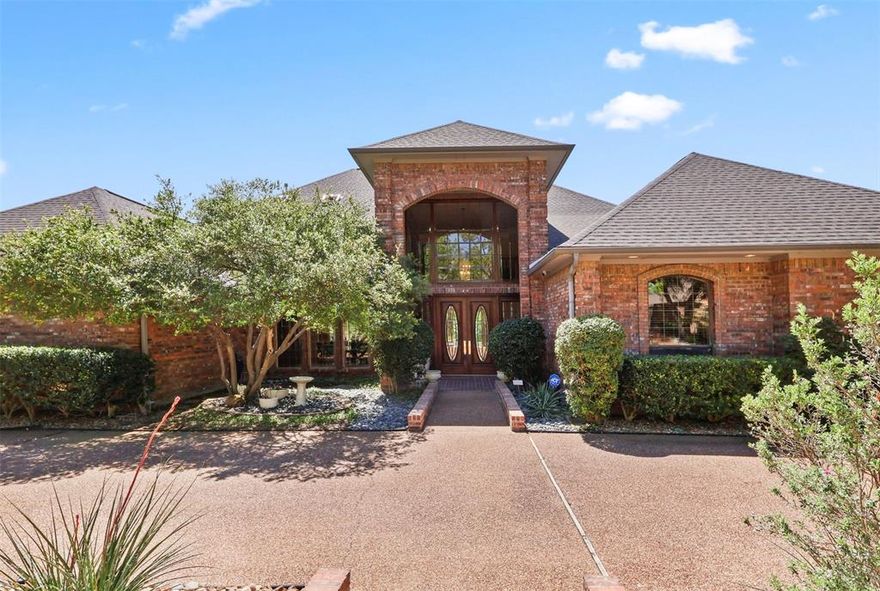 Situated on a rare 0.57-acre creek-facing lot in West Plano, this 5,780-square-foot residence offers 5 bedrooms and a 3-car garage with expansive floored attic storage. The interior features a double-door entry, marble and wood flooring, fresh paint (2025), and two wood-burning fireplaces. The floor plan provides significant separation of space, including two en-suite bedrooms and a remodeled second level. The kitchen is equipped with a gas cooktop, electric ovens, and extensive cabinetry. Outdoor amenities include a creek-view backyard with mature trees, two patios, and a pool with a diving pit rebuilt in 2022. Recent infrastructure updates include water heaters (2026), furnaces (2025), and three AC units (2015–2025), along with updated windows and a roof with a radiant barrier. Located on an interior street near Gleneagles Country Club and The Shops at Willow Bend, with convenient access to the Dallas North Tollway.