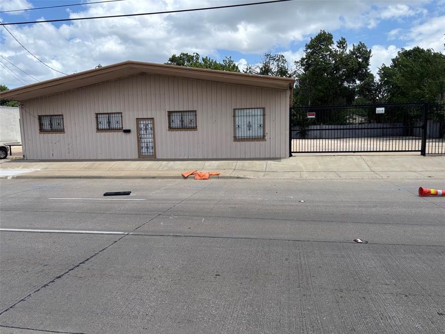 Great location on busy street. Lots of growth and traffic in this area.  Huge building on 2 lots with four offices and one full bath with shower and half bath. Property was used as a body shop and or mechanic shop. Has parking access from 28 to 30 cars on concrete and rod iron gate.
Lifts and compressor in back of building negotiable or sellers will remove. Two garage door access to building. Use your imagination to renovate for a mechanic shop or endless possibilities in this growing area! Sellers prefer to sell AS IS