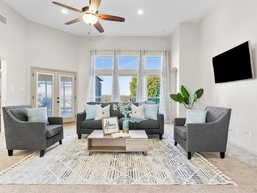 Custom-built home situated on a quiet cul-de-sac just under one acre, guest house, sparkling salt water pool, workshop with electricity with no HOA and no rear neighbors. This thoughtfully designed floor plan offers an attached guest suite complete with kitchen, living area, bedroom, and full bath—ideal for multigenerational living or long-term guests. Main living area features a floor-to-ceiling stone fireplace with hearth and opens to formal dining and an eat-in kitchen with island and additional seating. Dedicated home office, media room, and bonus room provide flexible living and work spaces. Outdoor amenities include a fenced swimming pool for safety and a shop with electricity. Conveniently located near State Highways 114 and 287, close to the Alliance Corridor, and approximately 30 minutes north of downtown Fort Worth. An offering of this caliber is rarely available—arrange your private showing to experience it firsthand.