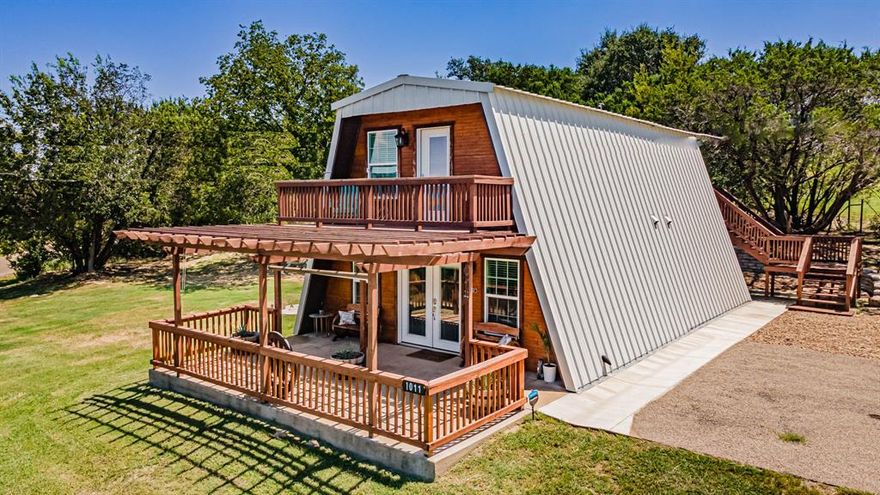 Step into this beautifully renovated A-frame home featuring 3 spacious bedrooms and 2 full baths. Every detail has been thoughtfully updated — from the custom cabinetry and new stainless steel appliances to the luxury flooring throughout. The inviting layout combines modern comfort with timeless charm. Enjoy outdoor living year-round with a pergola in the front and a covered back patio, perfect for relaxing or entertaining guests. 
This property is currently operating as a successful income-producing Airbnb. Whether you’re looking for a turnkey rental investment or a stylish full-time residence, this home checks every box — modern updates, proven income, and that unmistakable A-frame character. All Furniture is included with home. No furnishings will be removed from home.