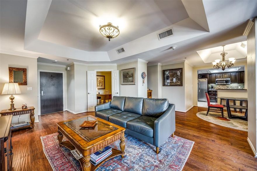 Luxury high-rise condo in Highland Park ISD. This 12th floor unit has an open floor plan; two bedrooms with en suite baths and a large balcony with access from the primary suite and the living area! The spacious primary includes a generous master bath and walk in custom closet. There are two assigned parking spots for Unit 1202 and an oversized storage unit. Updates include: new AC unit, new dishwasher, new commode, addition of garbage disposal, and Ring doorbell. The Shelton offers a premier location with numerous amenities including valet, concierge, secure gated parking, state of the art fitness center, resort-style heated pool and hot tub, clubhouse, and putting green.  Amazing location in the heart of shopping and dining along with sought-after HPISD.