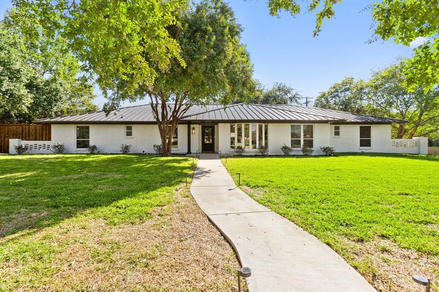 Fully reimagined and move-in ready, this classic North Dallas home turns - new home - into an instant feeling of comfort and style. Thoughtful renovations deliver high-impact updates throughout: engineered wood flooring underfoot, a chef’s kitchen with Taj Mahal quartzite waterfall countertops built for gatherings, spa-like updated bathrooms, a home office, a new dining room, and a brand-new metal roof. Modern landscaping frames a sparkling backyard retreat, perfect for entertaining or quiet relaxation. Set on an oversized lot in the Royal Ridge area, this address combines space with convenience. Minutes from the Dallas North Tollway and LBJ and I-635, Uptown and Downtown commutes, weekday flights from Love Field, and weekend adventures are effortlessly within reach. One of the secondary bedrooms is thoughtfully positioned off to the side, offering privacy ideal for a guest suite or mother-in-law retreat. Outdoor living is easy, with the Northaven Trail; North Dallas’s main east-west hike and bike path, just minutes away, complete with trailheads, water fountains, and community art. Education options are exceptional, with nearby public schools including Withers Elementary, E.D. Walker Middle, and W.T. White High, plus Dallas’s famed Private School Corridor within reach: The Hockaday School, St. Mark’s School of Texas, Jesuit Dallas, Ursuline Academy, and The Episcopal School of Dallas. Updates include a new metal roof, new pool filter system, new interior and exterior paint, coffee bar addition, redesigned kitchen with all new cabinets, chef’s refrigerator, 48-inch range, makeup vanity with sit-down area in the primary bathroom, office, fresh grass, epoxy-coated garage and mudroom, and new light fixtures. This single-story North Dallas gem blends style, function, and location, making everyday living simpler and weekends more enjoyable. 4210 Creekdale delivers the perfect balance of modern updates and classic charm.