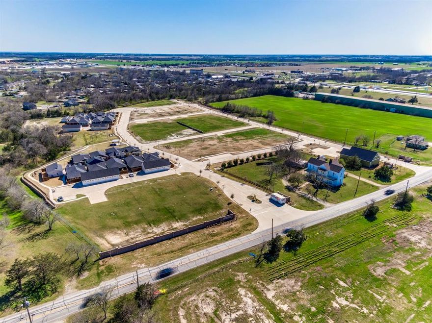 Prime development opportunity in the heart of Waxahachie. 56 lots available for purchase total - can purchase entire development or purchase by pod. Streets are poured and utilities installed. Total of 6 pods for sale with various amounts of lots. Each pod is required to have carriage house and garages built, see plans or call agent for further information.