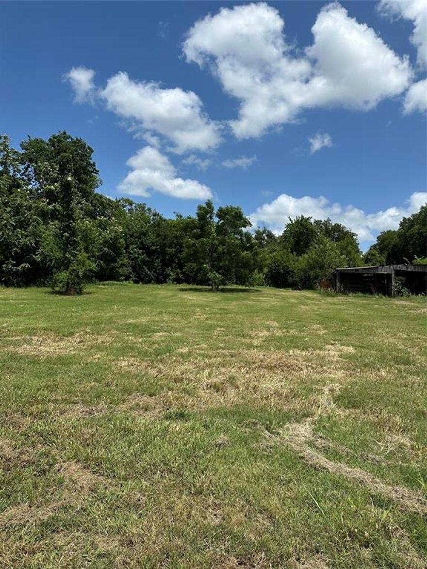 Oversized Lot in Honey Grove. Build your dream home or hold for investment. This 1.25 acres is two city lots. Lot 1 is .75 acre + or – and lot 2 is .50 acre. This property is minutes from downtown Honey Grove and only a few miles from 3 lakes which include Bois' D Arc Lake, Coffee Mill Lake and Crockett Lake.  Property is located on 5th which turns into FM 100. This property is a must see. Available to be subdivided Lot 1 is .75 acre + or - is $69,000 and Lot 2 .50 acre is $60,000. See MLS 20977488 and 20977478