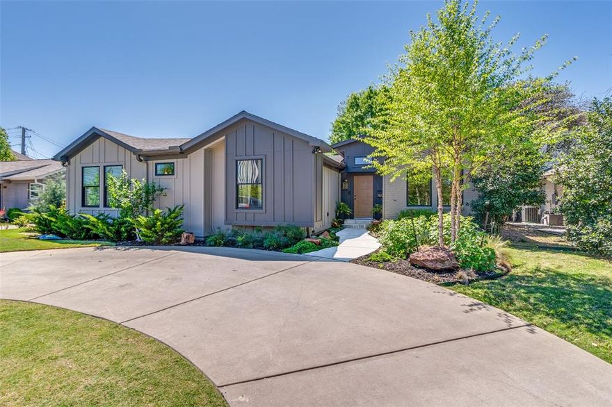 Zoned to HPISD and Boone Elementary, 7838 Southwestern offers a rare combination of single level living, thoughtful contemporary design and meaningful updates. Taken to the studs and expanded in 2023, the home delivers modern function without sacrificing warmth or proportion.
The floor plan is open where it matters, yet still provides separation with three distinct living areas including two flexible rooms suited for office, playroom, or a defined dining room if desired. Five bedrooms and three and a half baths are arranged on one level, creating an ease of living that is increasingly hard to find in the Park Cities area.
The kitchen is equipped with a full suite of stainless KitchenAid appliances including dual fuel range, wall oven, built-in microwave, dishwasher, and stainless refrigerator along with a wine chiller. Adjacent is a spacious pantry and laundry room. The kitchen opens directly to the main living spaces and out to the patio, supporting both daily use and entertaining.
The primary suite is quietly set apart and includes a marble bath with double vanities, soaking tub, oversized shower and separate closets. Secondary baths are generously sized with double sinks and oversized tub showers. Hardwood floors run through the main areas, with carpet reserved for 2 of the bedrooms. Storage is notably abundant throughout.
Outdoor spaces are beautifully landscaped, privacy fenced and designed for low maintenance and year-round use with a large patio and turfed play space. A detached, alley entry 2 car garage and a front circle drive add convenience.
This home offers scale, updates, single story livability and a great backyard, all in a market area where those qualities rarely align. 7838 presents a compelling alternative to other properties in this price range in HPISD.