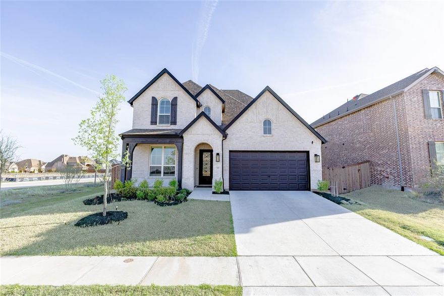 WELCOME HOME to Resort-Style Living in Award-Winning Sandbrock Ranch! This two-story Home Plan masterpiece blends luxury, comfort, and thoughtful upgrades. Featuring 4 bedrooms, 3 full baths, and a 2-car side-by side garage, its designed for both style and function. Inside, you'll find designer finishes at every turn: 8-ft doors, expansive wood flooring, quartz countertops, The gourmet kitchen is a chefs dream with stainless steel appliances, 5-burner gas cooktop, double ovens, oversized island, built-in microwave, butlers-style cabinet peninsula, walk-in pantry, plus under-over-cabinet lighting. Unwind in the Owners Retreat, featuring a soaking tub, separate shower, dual vanities, and a spacious walk-in closet. For movie nights, the home theater comes fully equipped with a projector and massive screen. Sandbrock Ranch residents enjoy top-tier amenities: the Carriage House Amenity Center with fitness facility, resort pool & splash pad, playgrounds, Scouts Corner Dog Park, and the whimsical Treehouse Adventure Park. A private K12 school is nearby for ultimate convenience. Luxury. Comfort. Recreation. This home has it all. Refrigerator, Washer & Dryer and Water Softener are included in the sales price.