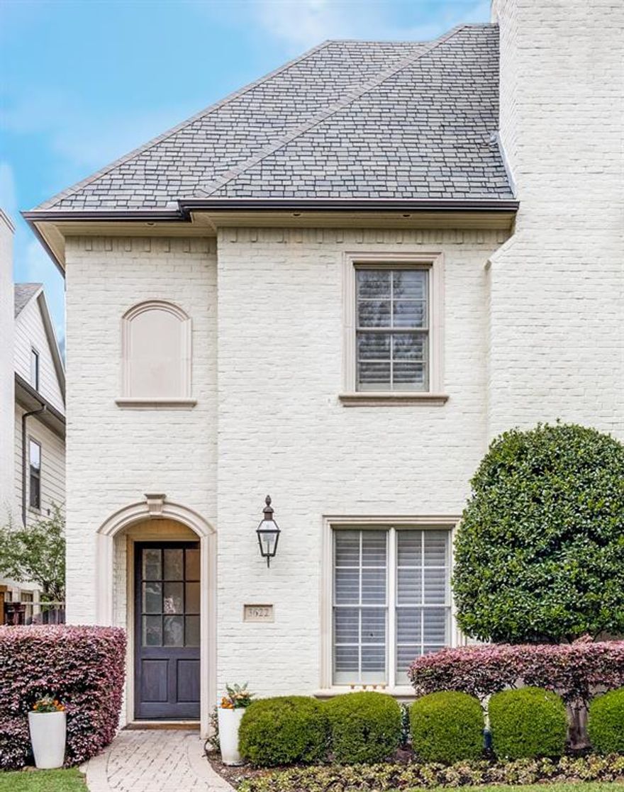 Updated, bright, and inviting, this home is situated in the heart of University Park and offers an assumable VA loan at 2.625% (for veteran's only). The first floor features an open layout with a study, dining area, powder bath, and a chef’s kitchen that overlooks a spacious living room complete with a wood-burning fireplace, high beamed ceilings, and crown molding. The kitchen is equipped with stainless steel appliances, a large center island, ice maker, wine fridge, ample cabinet storage, and a cozy eat-in breakfast nook. Upstairs, the second floor includes the primary suite and three guest bedrooms. The newly renovated primary bath showcases a soaking tub, separate shower, dual sinks, and elegant marble finishes. A spacious walk-in closet with generous storage completes the suite. The third floor offers an oversized fifth bedroom—perfect as a media room, playroom, or guest suite—with a full bath and walk-in closet. Outside, enjoy a covered patio, landscaped side yard, turfed lawn, and an additional parking space that could be enclosed to expand the backyard. A circle driveway in front and a tandem two-car garage accessible via the back alley provide ample parking. This sophisticated home is ideally located within walking distance of Highland Park schools, SMU, Snider Plaza, Dallas Country Club, and several parks.