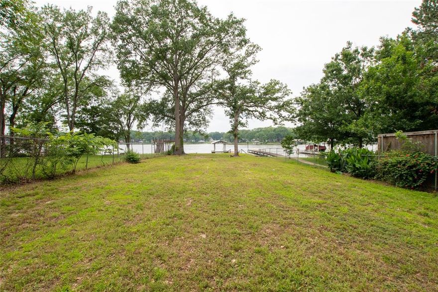 Build your dream lake house, on this beautiful waterfront lot on Cedar Creek Lake! Includes a new (nearly $40,000) hot dipped galvanized seawall, and a boat dock with 2 jet ski lifts. This is a deep water lot - which is very ideal if you know the lake area. Start enjoying lake life today. Owner will finance at a 5% interest rate with a reasonable down payment!