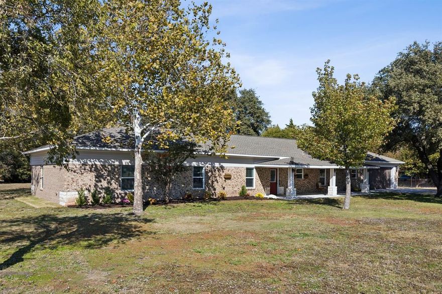 Discover comfort & style in this beautifully appointed 5-bedroom, 3-bath ranch-style brick home, nestled in the vibrant community of St. Paul. Functionally designed, this property offers a versatile layout ideal for modern living, complete with an oversized, pull thru 2-car+ garage and 1.6+- acres.

As you step inside, you'll be greeted by the rich warmth of wood floors (from a 1920s Ft Hood gymnasium) that flow seamlessly through the main living areas, accentuating the home’s charming character. The expansive living room is a perfect canvas for hosting gatherings or simply unwinding in a tranquil setting. In the back of the home you'll find a game or play room with HUGE closets & an exterior entrance, creating an ideal space for entertainment and leisure. Whether it's board games, billiards, toys or movies this room accommodates it all.

The well-designed kitchen, featuring ample cabinetry, quartz counters & a double oven, caters to culinary enthusiasts & families alike. Directly adjacent to the kitchen, a cozy dining area provides a picturesque setting for meals, with views of the lush backyard.

With 2 primary suites (both ensuite), there is so much versatility. And 3 secondary bedrooms means there's room for everyone.

Step outside to enjoy a spacious backyard, ideal for outdoor entertaining, gardening, or quiet weekends in the fresh air. The all-brick exterior ensures durability and classic curb appeal, while the convenient location offers easy access to local amenities such as award winning schools, playgrounds, parks, shopping & dining. 

This impeccable home perfectly combines form and function, offering a serene sanctuary with enough space for all your lifestyle needs. Experience the best of Wylie and St. Paul living in this impressive residence designed for comfort, enjoyment and wide open spaces.