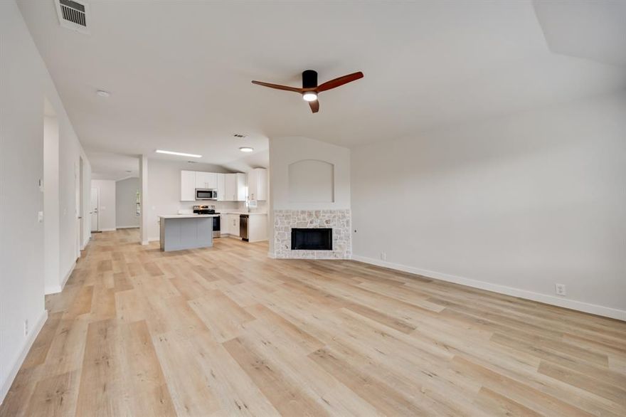 Looking for a beautifully updated contemporary home? Look no further!
This stunning property has been completely renovated with modern finishes and thoughtful design throughout. Step into a welcoming foyer featuring luxury vinyl plank flooring that flows seamlessly into the open-concept living room and formal dining area. The heart of the home is the gorgeous kitchen, showcasing new Shaker-style cabinets, quartz countertops, an island, and a cozy breakfast area that opens to the spacious family room with a striking stone gas fireplace. The primary suite offers a relaxing retreat with a dual-sink vanity, oversized walk-in shower, and a garden tub. The updated hall bathroom features a sleek frameless glass shower enclosure and an extra-large walk-in shower. Additional highlights include a clean, finished garage with epoxy flooring and fresh, contemporary touches throughout.