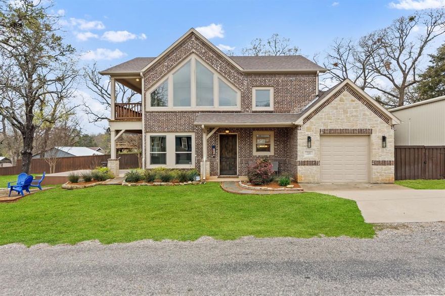 Custom builder’s personal home just a 2-minute walk to the Lake Texoma Beach Front in the prestigious Miller's Cove, situated on a corner lot of just over half an acre. This thoughtfully designed property features an open floor plan with vaulted ceilings and massive windows, filling the home with natural light and offering views of the water right from the living room. Enjoy outdoor living with a covered patio, private backyard, hot tub, and fire pit—perfect for relaxing evenings or entertaining guests. The property also includes an impressive 1,260 sq ft insulated shop with AC and private office space, plus epoxy floors throughout. The shop opening is 10.5 ft, allowing for a camper or boat storage. Whether you’re looking for a full-time residence, summer lake getaway, or an income-producing Airbnb, this versatile property offers comfort, style, and proximity to the lake in one exceptional package.