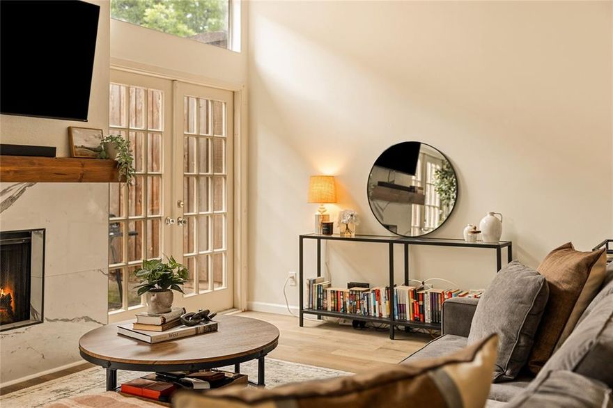 LOCATION. TURNKEY. EFFORTLESS. Beautifully renovated condo in the heart of Oak Lawn, 4015 Holland Avenue combines timeless character with clean, intentional updates and one of the best locations in Dallas. Natural light pours through oversized wood framed double French doors, while tall ceilings and a wood burning fireplace create a space that feels warm, open, and inviting. The kitchen was completely redesigned with custom cabinetry, quartz countertops, and new appliances, complemented by new paint, flooring, and extensive system upgrades including HVAC, electrical, and water heater. The private porch offers the perfect spot to entertain or unwind, while the oversized bedrooms provide a layout that lives comfortably and functionally. Just minutes from Dallas Love Field, Katy Trail, Highland Park Village, and some of Dallas’ best restaurants, coffee shops, and nightlife, this is city living at its best in a location that truly doesn’t get better than this.