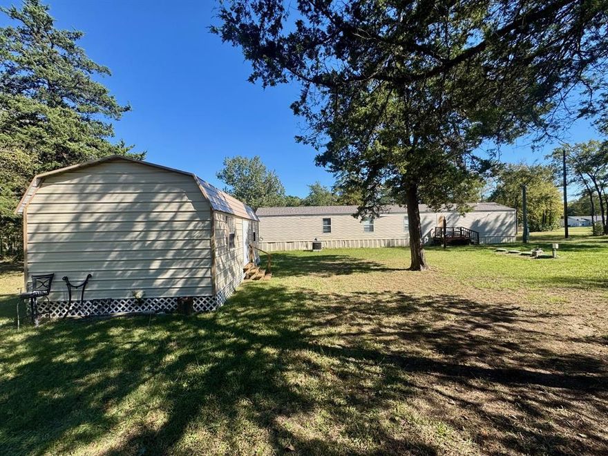 Very nice manufactured home on a beautiful lot in Thunderbird Point on Lake Bob Sandlin. Three bedrooms, 2 baths with a covered carport. This property is a little over an acre with a nice shop-storage building. Lake living made easy!