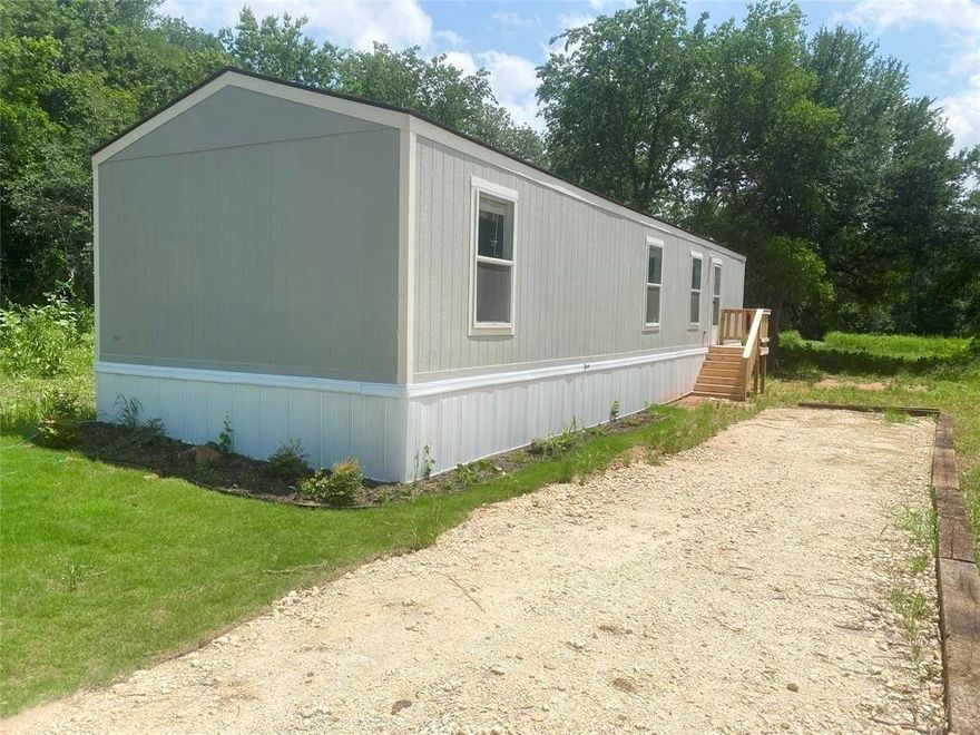 Move-In Ready! Discover the perfect blend of comfort and convenience in this charming 2-bedroom, 2-bathroom home, perfectly situated just minutes away from Granbury’s fantastic parks, shopping, dining, and live entertainment. Featuring linoleum flooring throughout, ensuring an easy clean. The dining room features built-in cabinets, providing ample storage space for all your essentials. The community offers a range of amenities including a swimming pool, parks, basketball court, fishing pier, boat ramp and parking. Additionally, the clubhouse is available to rent for hosting family gatherings and events.