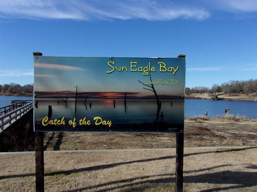 Weekend, vacation or permane429.00 nt home! If you have a love for fishing, skiing, swimming, boating, etc. On world famous Lake Fork! Four lots located in Sun Eagle Bay, a waterfront community with inground swimming pool, 2 fishing piers, 2 boat launches, and much more! Also included are the following: 2015 Forrest River Sierra RV with metal cover, wood deck, 3 metal outbuildings, an extra-large RV cover, fish cleaning station, firepit, aerobic system and much more!  Property owners association dues are 429 annually.  Motivated Seller make an offer.