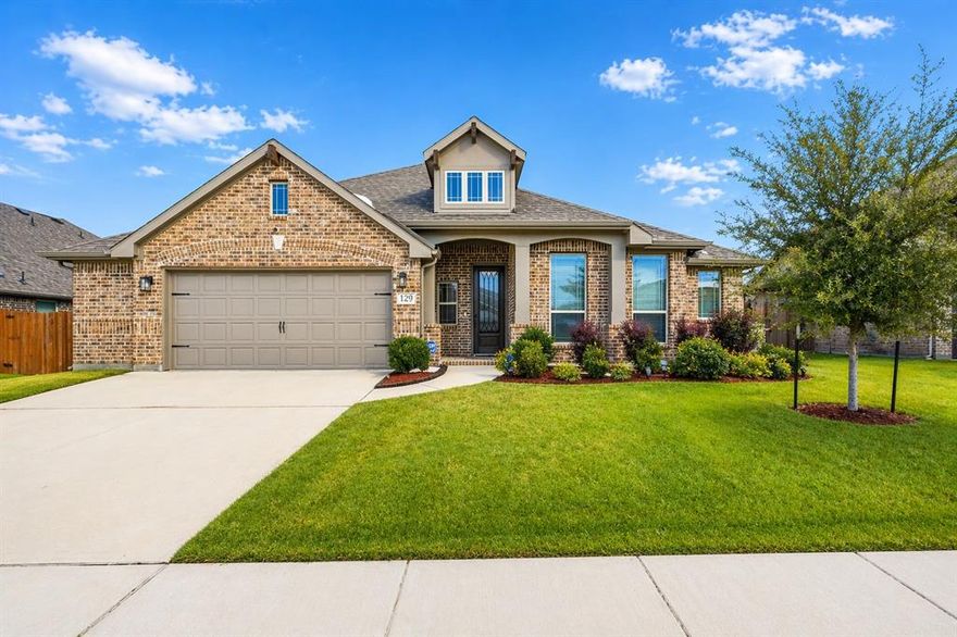 Welcome to 129 Fireberry Dr in the heart of Red Oak! This beautifully maintained 4-bedroom, 2-bath home offers the perfect blend of comfort, space, and functionality. Step inside to an inviting open-concept layout featuring a spacious living area ideal for both relaxing and entertaining.

The kitchen is a true standout, complete with a center island, double oven, gas range, ample cabinetry, and generous counter space—all seamlessly flowing into the dining area for effortless everyday living and hosting.

The private primary suite serves as a peaceful retreat with an en-suite bath and abundant closet space. Three additional bedrooms provide flexibility for guests, a home office, or a growing household. A rare 2.5-car garage adds valuable extra space for storage, a workshop, or recreational equipment.

Step outside to your backyard oasis featuring an extended covered patio that spans the width of the home—perfect for entertaining—with built-in electrical access for added convenience. Unwind in the pergola-covered hot tub with an adjustable open-and-close feature, also equipped with electrical service, all surrounded by thoughtfully designed landscaping. Pergola and hot tub included!

Ideally located near schools, shopping, dining, and offering easy access to major highways, this home combines everyday comfort with exceptional convenience.
