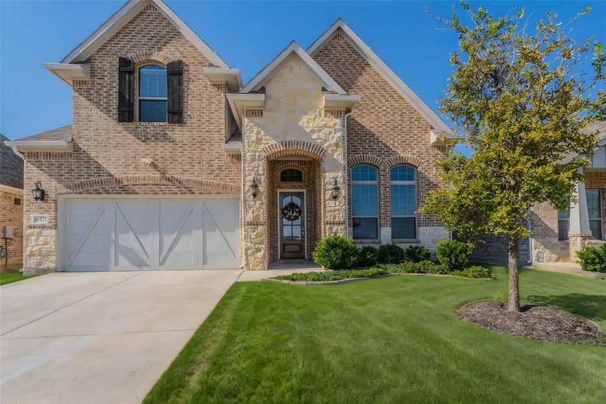 Be Captivated by the beauty of this stunning home, designed to inspire everyday living and entertaining! The kitchen embodies elegance with its cabinets, large center island, and sparkling stainless steel appliances. The attached dining area and spacious family room allow for family dinners and fellowship. Downstairs there are beautiful hand scraped hardwoods in the main living areas. The luxury of the primary suite, complete with a private ensuite boasting a double vanity, extra large spa-like shower and dual private closets. The main floor also includes a spacious study with glass French doors. Upstairs, two large bedrooms share a full bath with a third bedroom (second primary suite)containing its own ensuite. A game room rounds out the second floor, a perfect space for entertaining. Green Meadows embodies the essence of community living in this northern Dallas suburb. Enjoy valuable amenities such as a clubhouse, amazing pool with two huge waterslides, fabulous amenities center with fitness facility, and playgrounds, all built within open spaces and serene trails for your leisure and relaxation. Currently building sports courts including pickleball!!! Your children will thrive in the highly acclaimed Celina ISD schools. Nestled on the outskirts of a  charming town, an array of entertainment and shopping options are within close reach, making every day a new opportunity to embrace the vibrant lifestyle this community offers. **** BRAND NEW ELEMENTARY school opening in the neighborhood in the fall of 2026