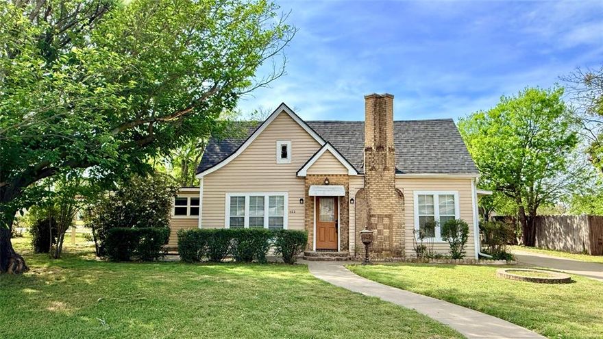 Charming and full of character, this 3-bedroom, 1-bath Tudor-style home sits on a spacious quarter-acre lot in the heart of Graham. This vintage beauty showcases many original features, including elegant chandeliers, classic doors, unique hardware, and custom cabinetry that highlight its timeless appeal. The home is move-in ready and offers plenty of parking and storage, making it as functional as it is charming. Recent updates provide peace of mind and energy efficiency, including a new shingle roof, updated HVAC system, and solar panels to help keep utility costs down. Make this vintage beauty yours today!