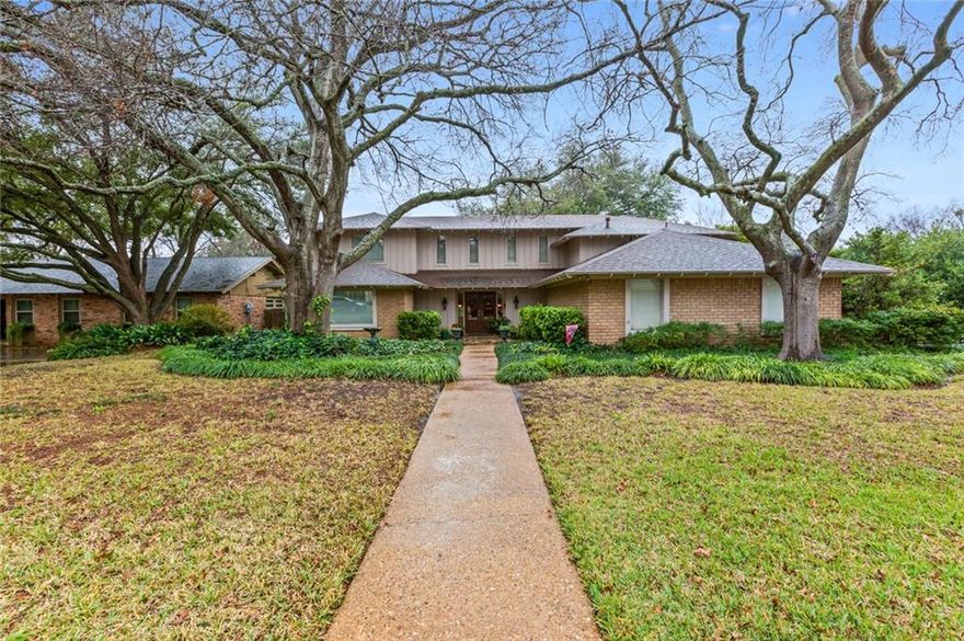 Two Story Beauty located on  a quiet, peaceful cul de sac in a lovely North Waco area.    This is a special home with a gorgeous family room that has a 2 story vaulted, wooded shiplap ceiling, wood burning fireplace and pretty views of the lovely backyard and pool.  Family room opens to a large dining area with many pretty windows.  2nd living area downstairs or could be 5th bedroom if needed. Great floor plan with 4th bedroom and full bath downstairs, master in its own separate wing up one flight of stairs and 2 large bedrooms and bath in another section of the upstairs.  Wonderful upstairs study that opens to the vaulted ceiling of the family room.  The lot is covered in huge grand oak trees, and the backyard has a large gunite pool and inviting patios. Large, private master suite with a balcony overlooking the backyard paradise.