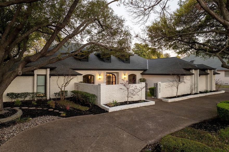 Substantially renovated in 2023, this stunning residence offers prime frontage and sweeping views of hole #3 at coveted Bent Tree Country Club. A gated front courtyard welcomes guests inside to a wide open-concept living environment featuring a modern entertainer’s bar, an inviting family room with fireplace, and a dream kitchen complete with double stone islands, high-end appliances, and a walk-in pantry room with additional counter space and an appliance station. The expansive primary suite showcases pitched ceilings, a striking stone fireplace, a spa-inspired oversized bathroom, and voluminous his-and-her walk-in closets. The home includes five bedrooms and five bathrooms, along with a dedicated home gym and a stylish office retreat. Designed for exceptional entertaining, the backyard boasts a pool, spa, and covered outdoor kitchen with pizza oven and entertainment bar overlooking the picturesque fairway. Measurements are approximate, buyer to verify room sizes and square footage.
