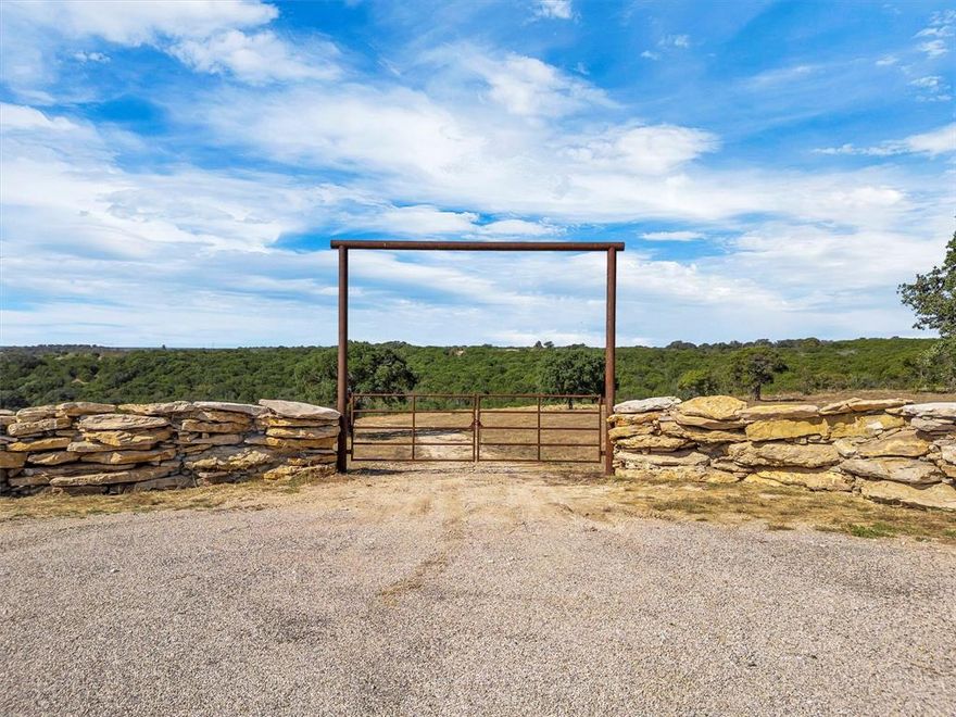 Welcome to 1064 Sanctuary Drive, where peace, privacy, and wide-open Texas views all come together. Sitting at the end of a quiet cul-de-sac inside Sanctuary Oaks, this 11-acre tract has a 4 foot tall custom stone entrance with a gate that instantly sets the tone! It’s special out here.

The private road is already in, the pad site is cut and ready, and the property’s fully fenced. From the top, you’ve got unbelievable views that stretch across the treetops, the kind that change with every sunset. Down below, a natural seasonal creek winds through the land, carving out a shaded area full of mature oaks and wildlife. It’s the perfect mix…elevated build site up top, hunting and exploring down below.

Whether you’re ready to break ground on your dream home or just want to own a piece of land that feels like yours, this property is ready for it. Power and road access are in place, and you’re just minutes from Tolar ISD, Granbury, and Stephenville.

Big views. Quiet setting. Real Texas feel. That’s 1064 Sanctuary Drive.