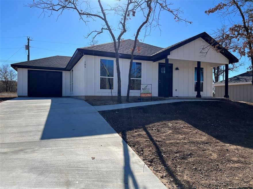 New beautiful craftsman style home with open floor plan. This home features granite countertops, custom cabinets, tile in common areas and bathrooms, large utility room, single car garage, nice lots with some trees. Short drive or walk to Bridgeport Lake. This neighborhood sits in front of the entrance to Wise county Park. So bring your fishing poles and enjoy the benefits of being so close to the lake, boat ramp and beach are located in Wise county park.