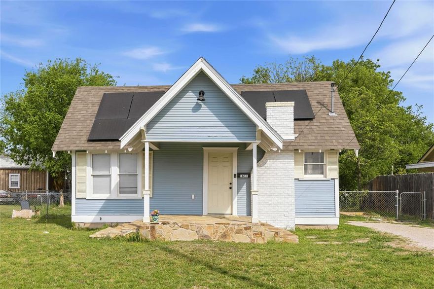 Charming Craftsman-style cottage packed with updates and efficiency! This 2-bedroom, 1-bath home offers 952 square feet of comfortable living with a functional layout and inviting character throughout. The updated kitchen features granite countertops, stainless steel appliances, and a clean, modern feel that flows easily into the main living space. Inside, you’ll find a beautiful decorative white brick mantel that adds warmth and charm, while the bathroom showcases a nicely tiled shower surround for a fresh, updated look. Natural light fills the home, creating a bright and welcoming atmosphere.
Step outside to enjoy the spacious backyard. Installed solar panels offer added energy efficiency and long-term savings. With its classic curb appeal and thoughtful updates, this home is perfect for first-time buyers, downsizers, or anyone looking for a move-in ready property with character. Don’t miss out on this centrally located home with a charming blend of timeless style and modern convenience!