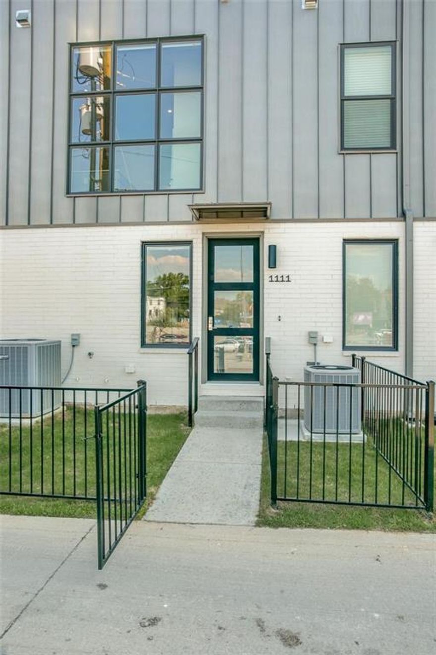 Beautiful, 3-story townhome in the thriving Henderson restaurant and entertainment district.  This corner unit features floor to ceiling windows and lots of natural light throughout the living areas.  The open floor plan has a state-of-the art kitchen with a gas stove, stainless appliances and breakfast bar which opens to the living area.   The two bedrooms both have their own bathrooms and walk-in closets.  Attached 2-car garage. Refrigerator, washer and dryer included with lease.